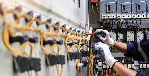 Professional Electrician technician working in Commerce, CA